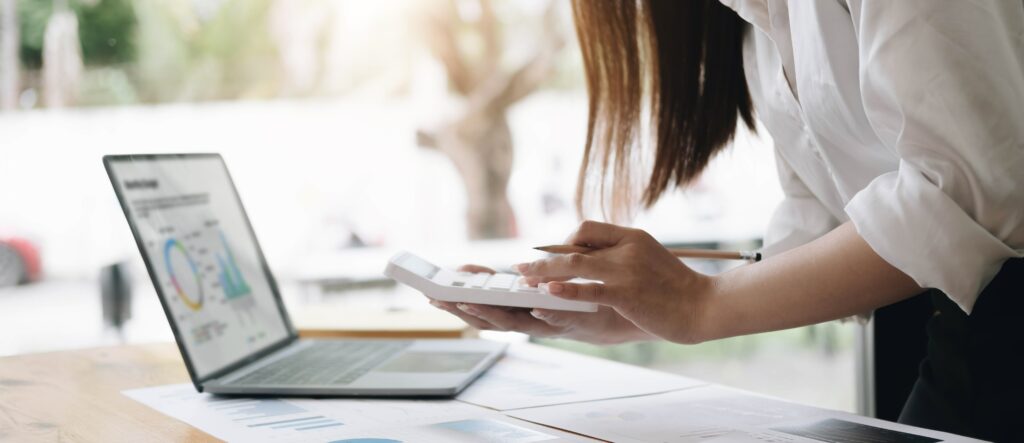 woman working on her retirement taxes for tax time 2023