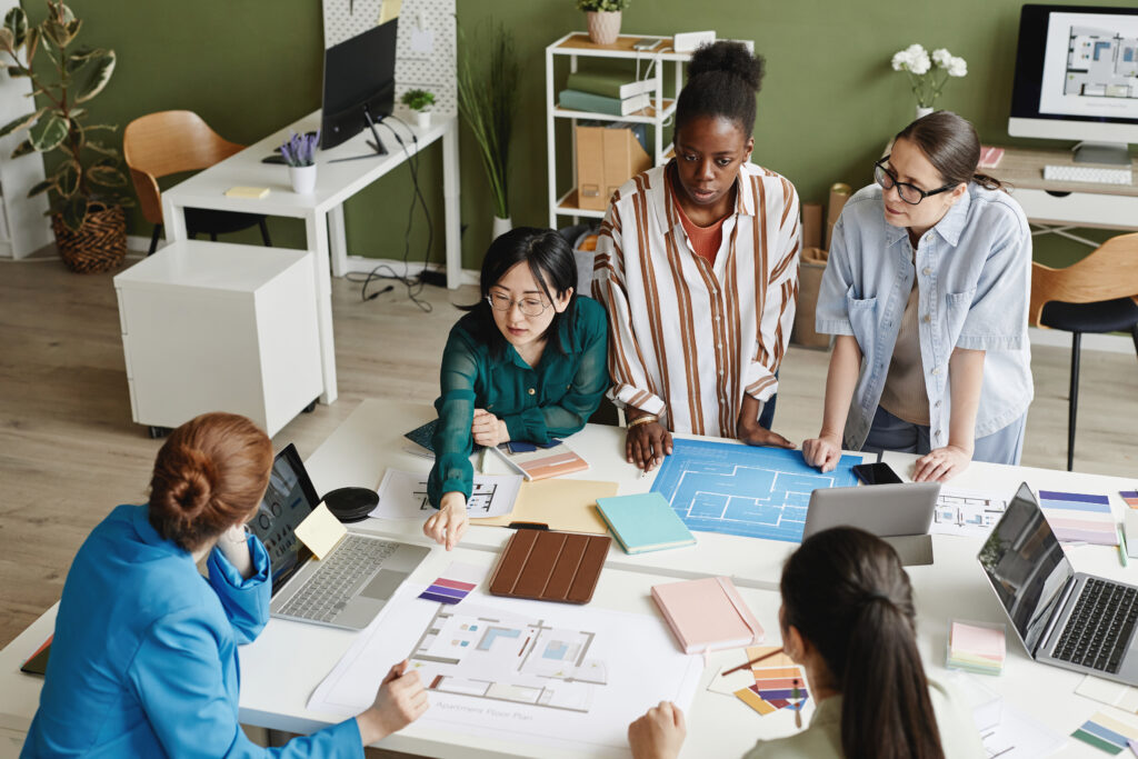 How QBCC Ensures Support for Construction Businesses  - Women working with new construction startup